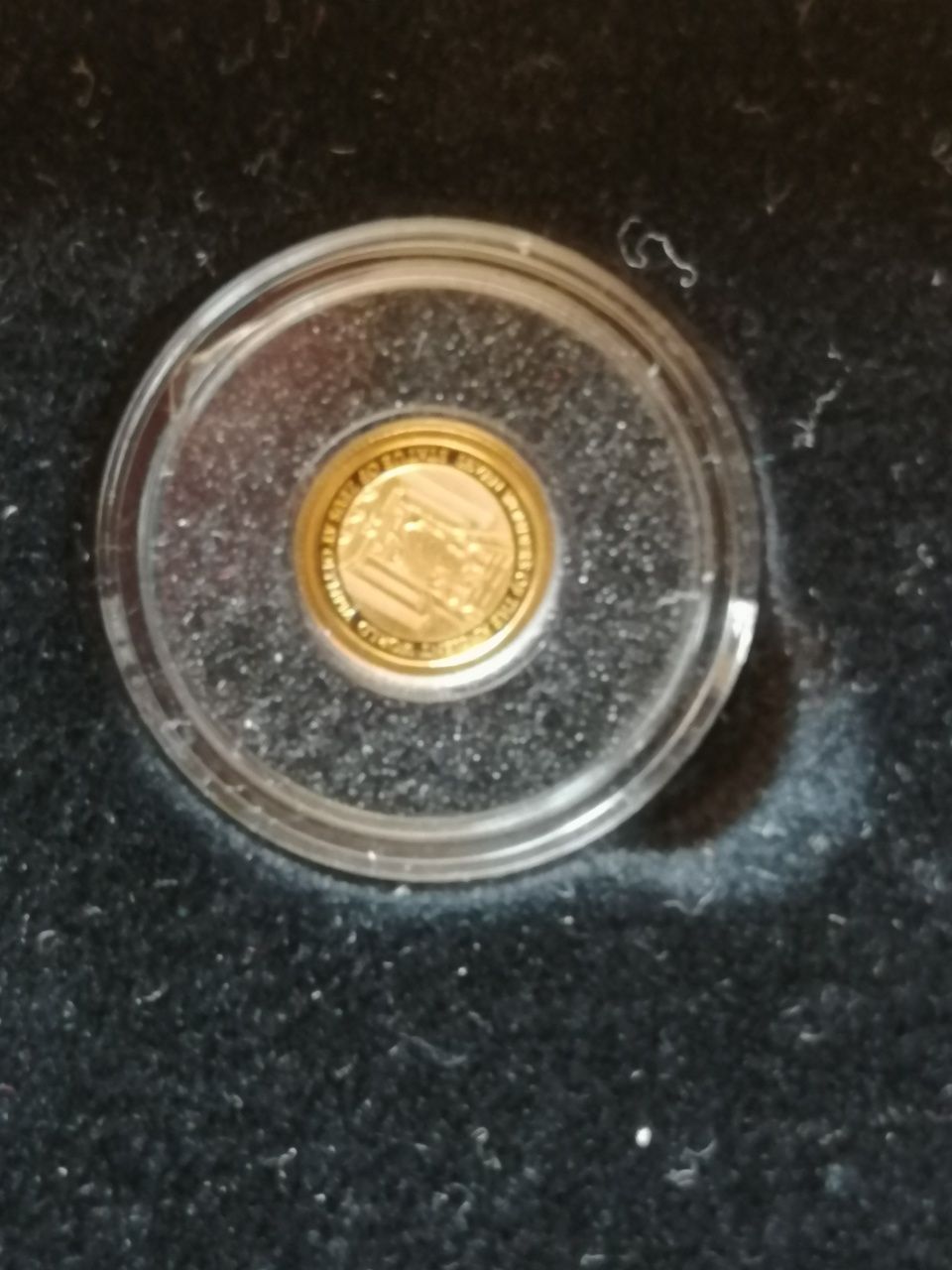 7 szt złotych monet z serii Najmniejsze Monety Świata