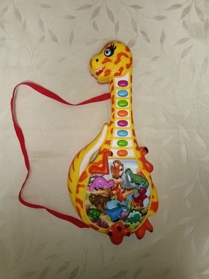 Детская музыкальная гитара "Динозавр"