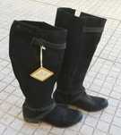 Botas de cano alto em pele