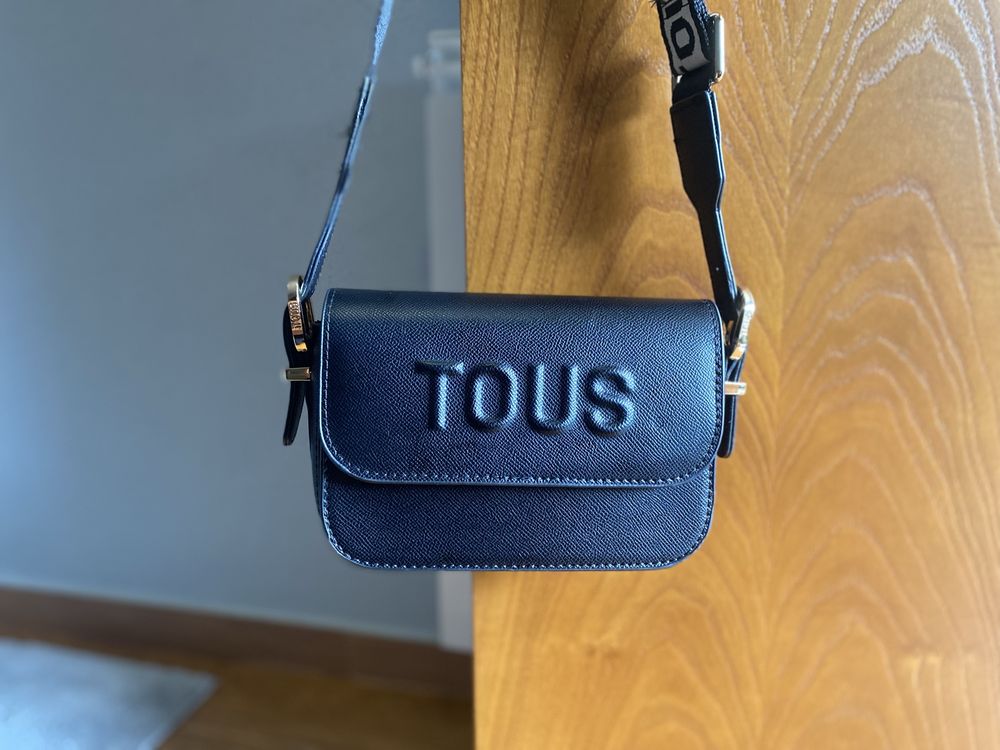 Bolsa da “Tous,”como nova