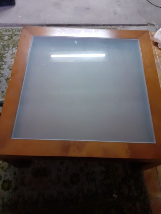 Mesa de centro com tampo deslizante