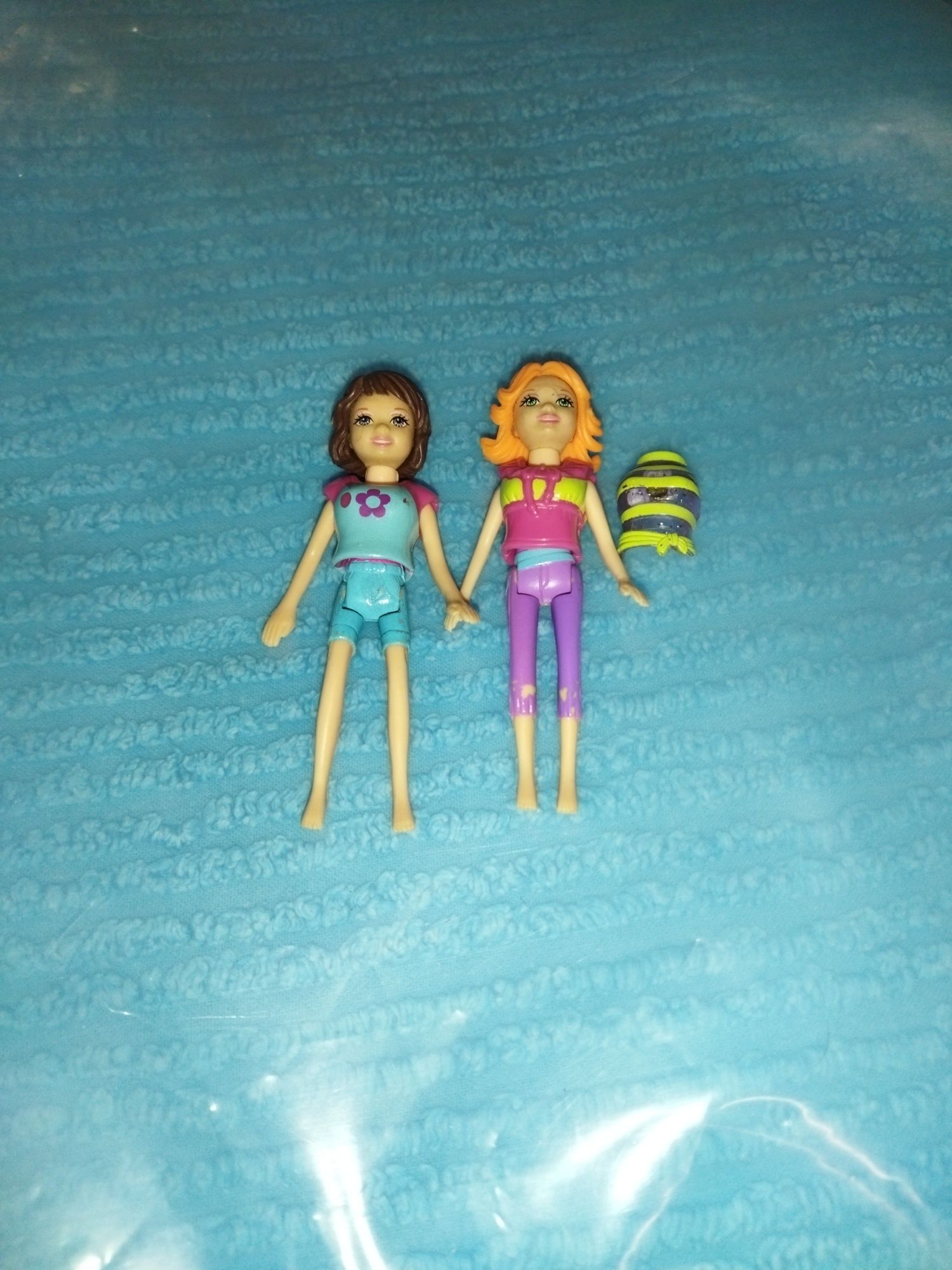 2 pollypockets com roupa magnética