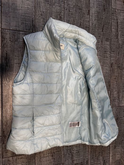 Пуховая желетка женская COLIN’S