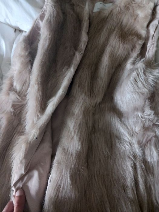 Colete pelo muito bom estado