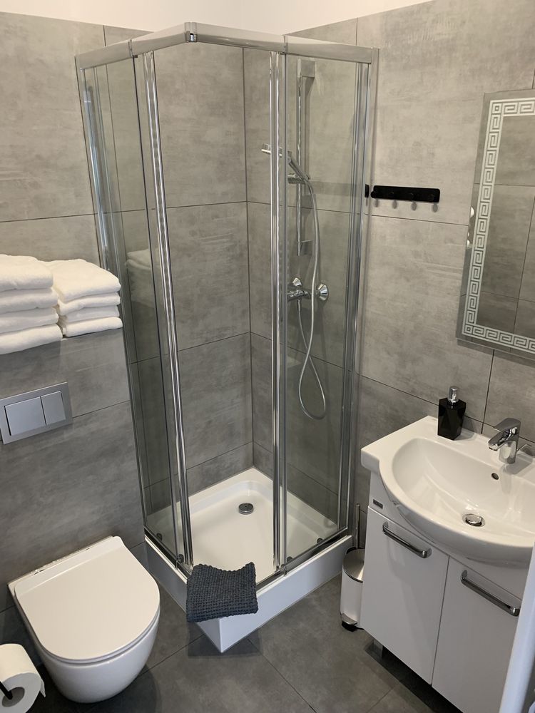 Aartamenty i pokoje z miejscem parkingowym i Jakuzzi