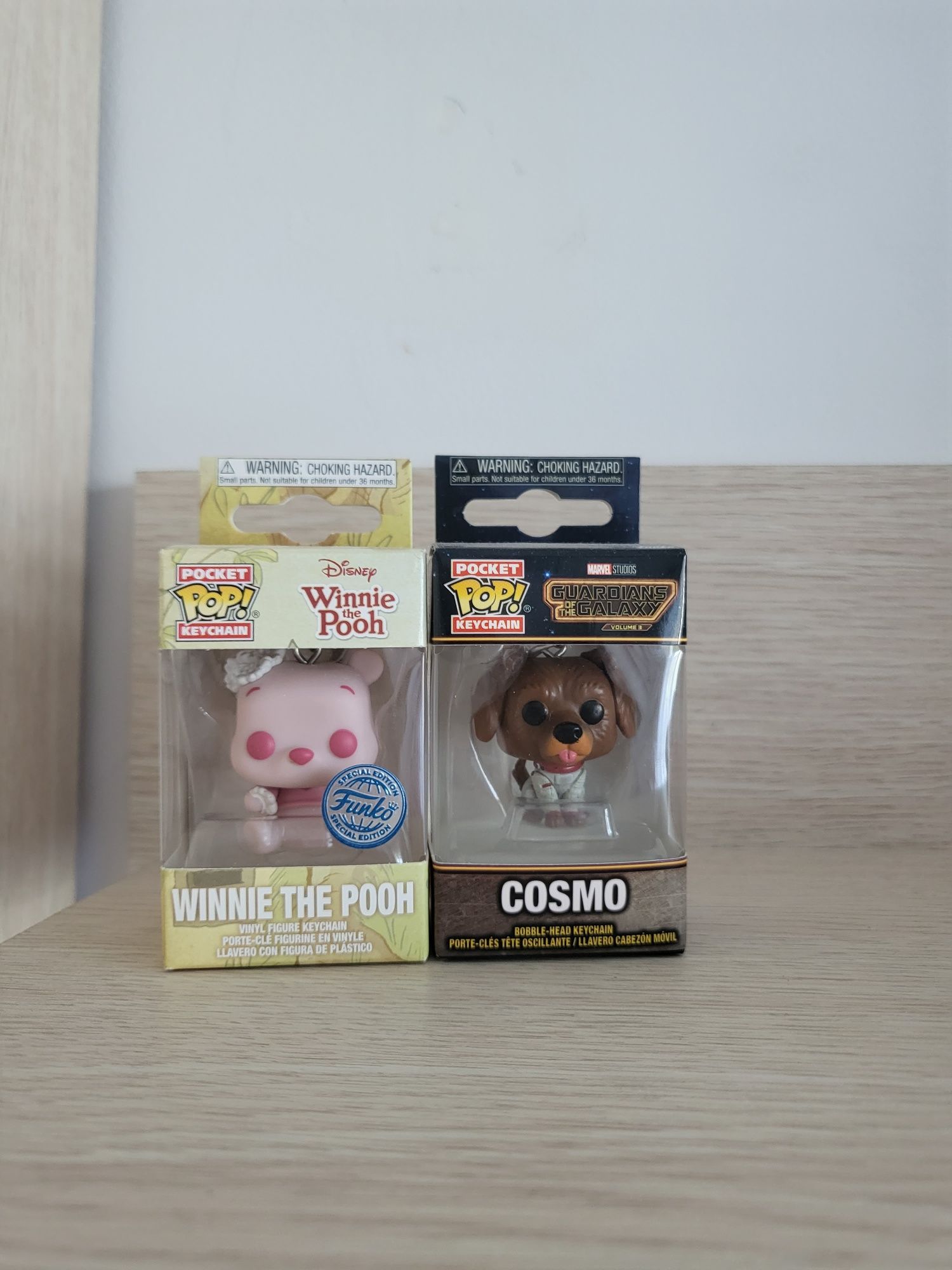 Dwa breloki Funko Pop Winne the pooh i Cosmo