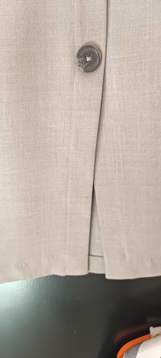 Jasnoszara spódnica z guzikami i wiazaniem