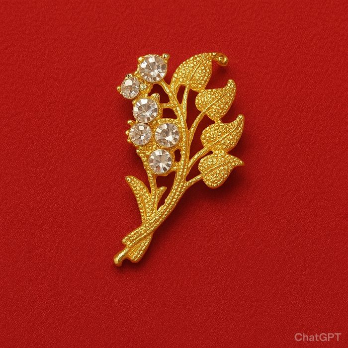 Broszka damska w złotym kolorze