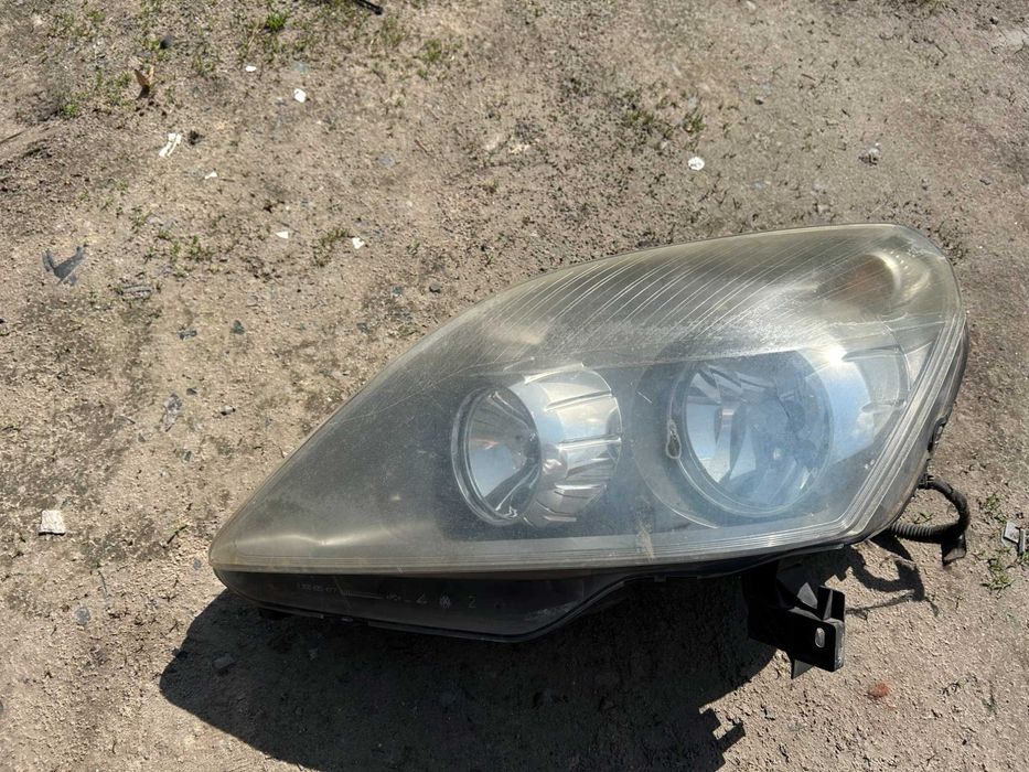 Opel ZAFIRA B 05-09 lampa LEWA przednia GM / EUROPA / wysylka oryginal