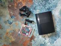 Sprzedam konsolę PS3 super slim plus gran turismo 5.