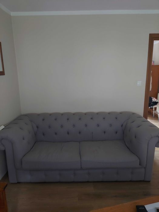 wygodna sofa rozkładana z pojemnikiem na pościel