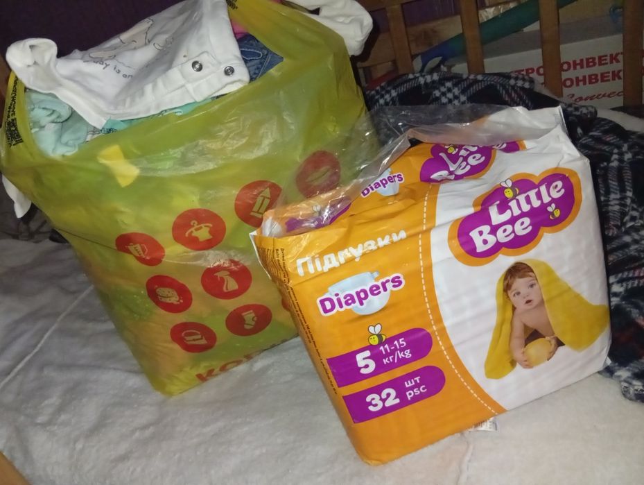 Продам дитячі речі і ходунки