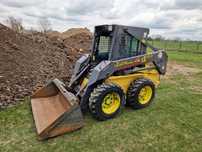 Miniładowarka New Holland LS140 Stan BDB Bobcat