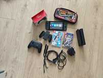 NINTENDO SWITCH + pro controller + 2 gry + pokrowiec