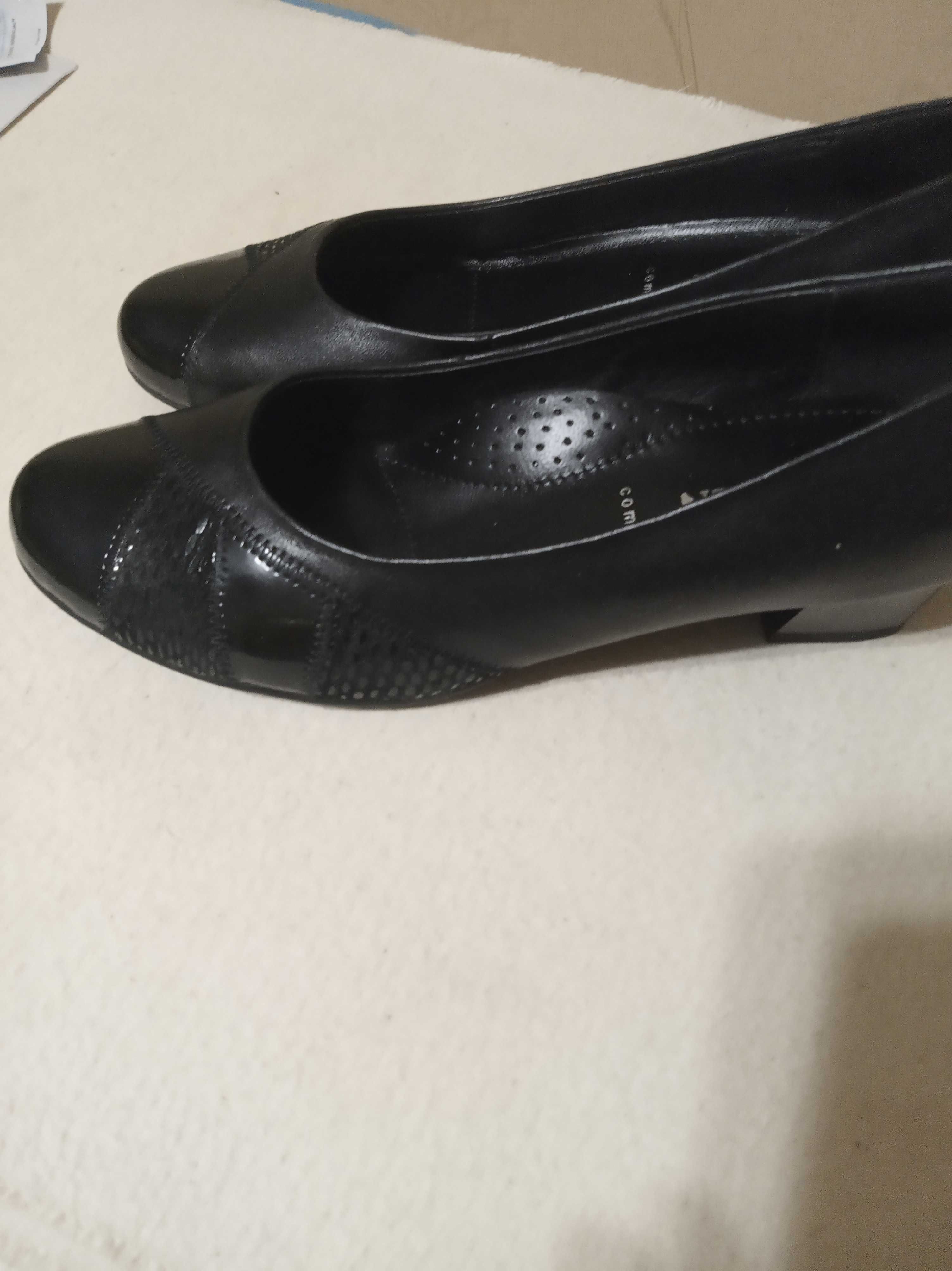 Продам новы кожаные женские туфельки  черного цвета