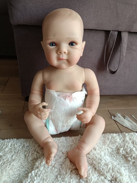 Lalka typy reborn w różowej sukience