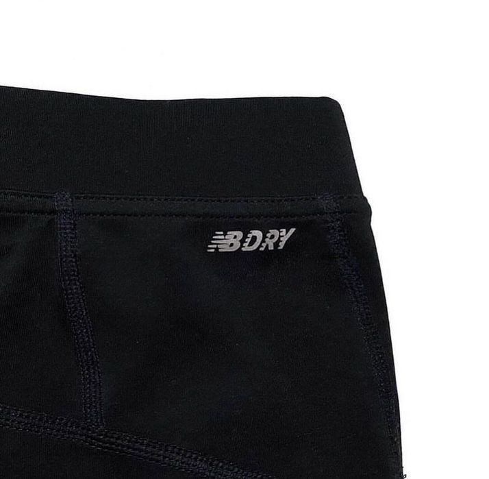 Беговые штаны New Balance.