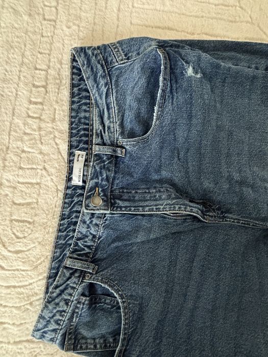 Джинси, жіночі з розрізом