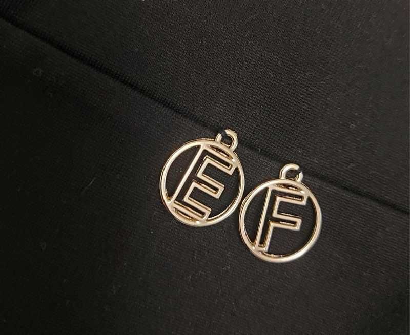 Spodnie Elisabetta Franchi logowane białe lampasy r. 38