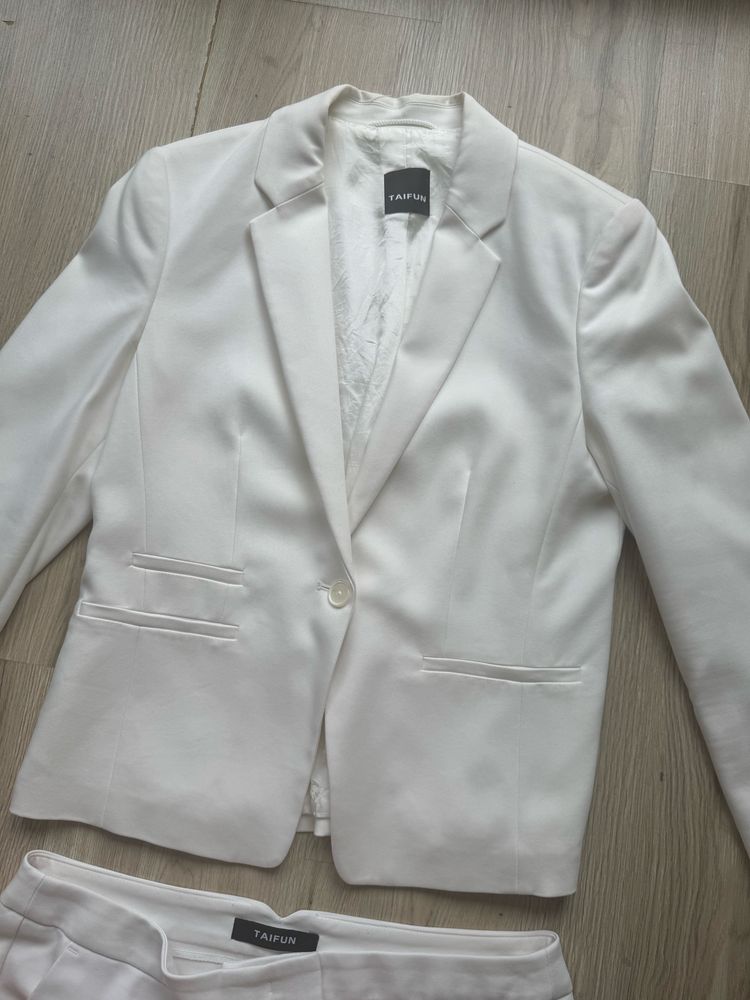 Garnitur bialy Taifun. Spodnie eleganckie. Marynarka