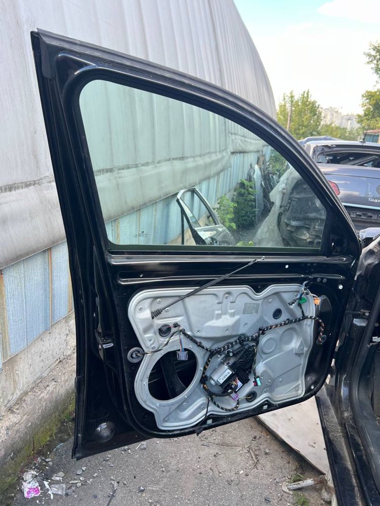 Передние двери Skoda Octavia A5