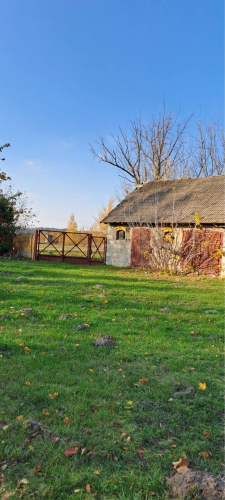 Działka (1500m2) w miejscowości Wola Stromiecka z budynkami gosp.