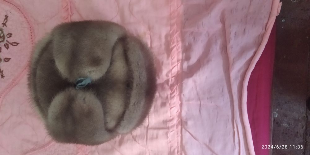 продам норковую новую шапку.