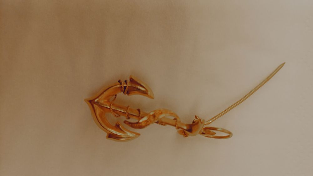 Alfinete de ouro