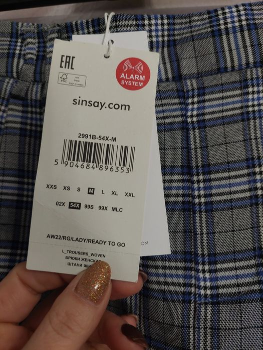 Nowe spodnie damskie w kratę Sinsay M chinosy