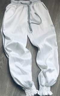 Spodnie atłasowe ściągacze srebrna nitka alladynki białe