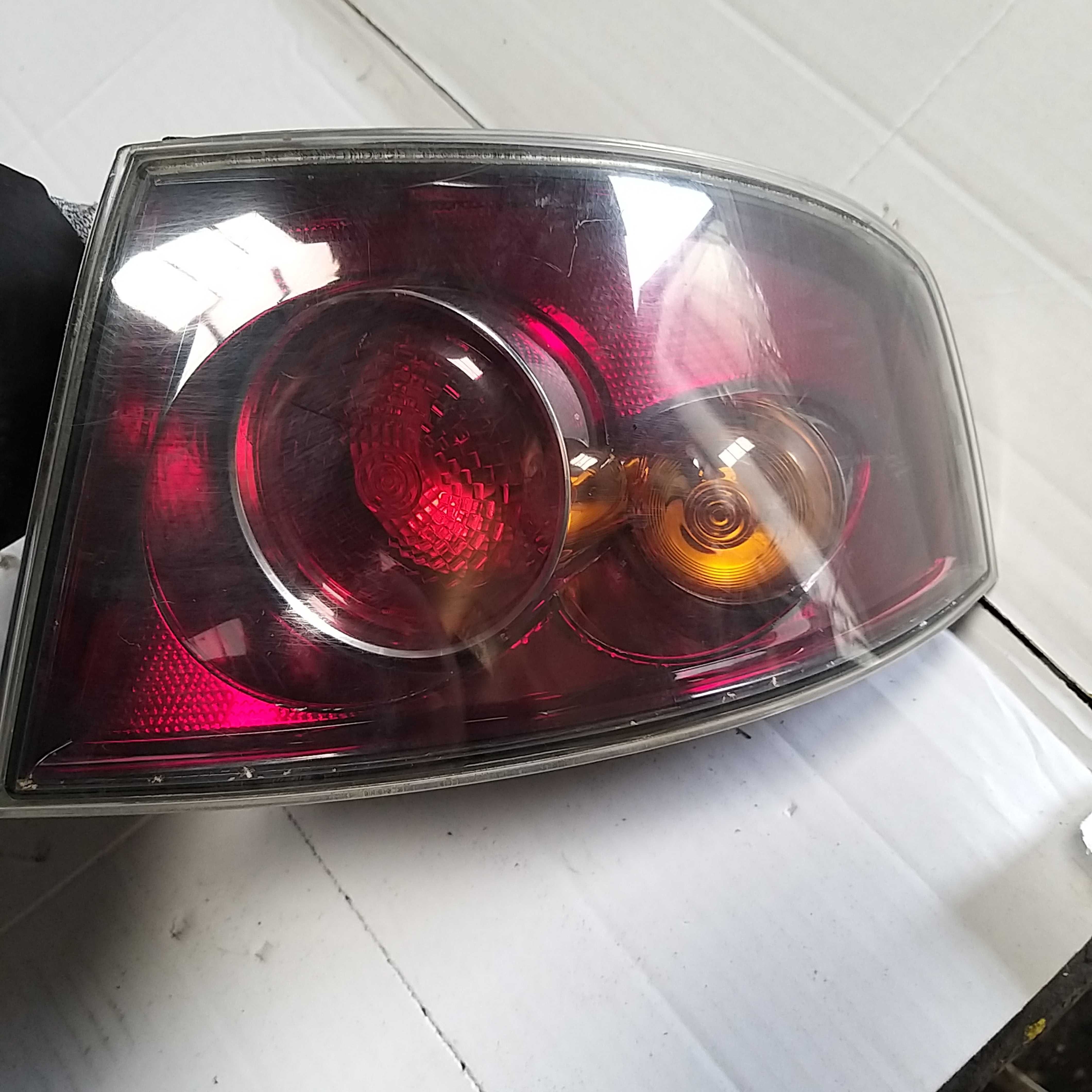 Lampa lampy prawa lewa tył Seat Ibiza III smoke KOMPLET