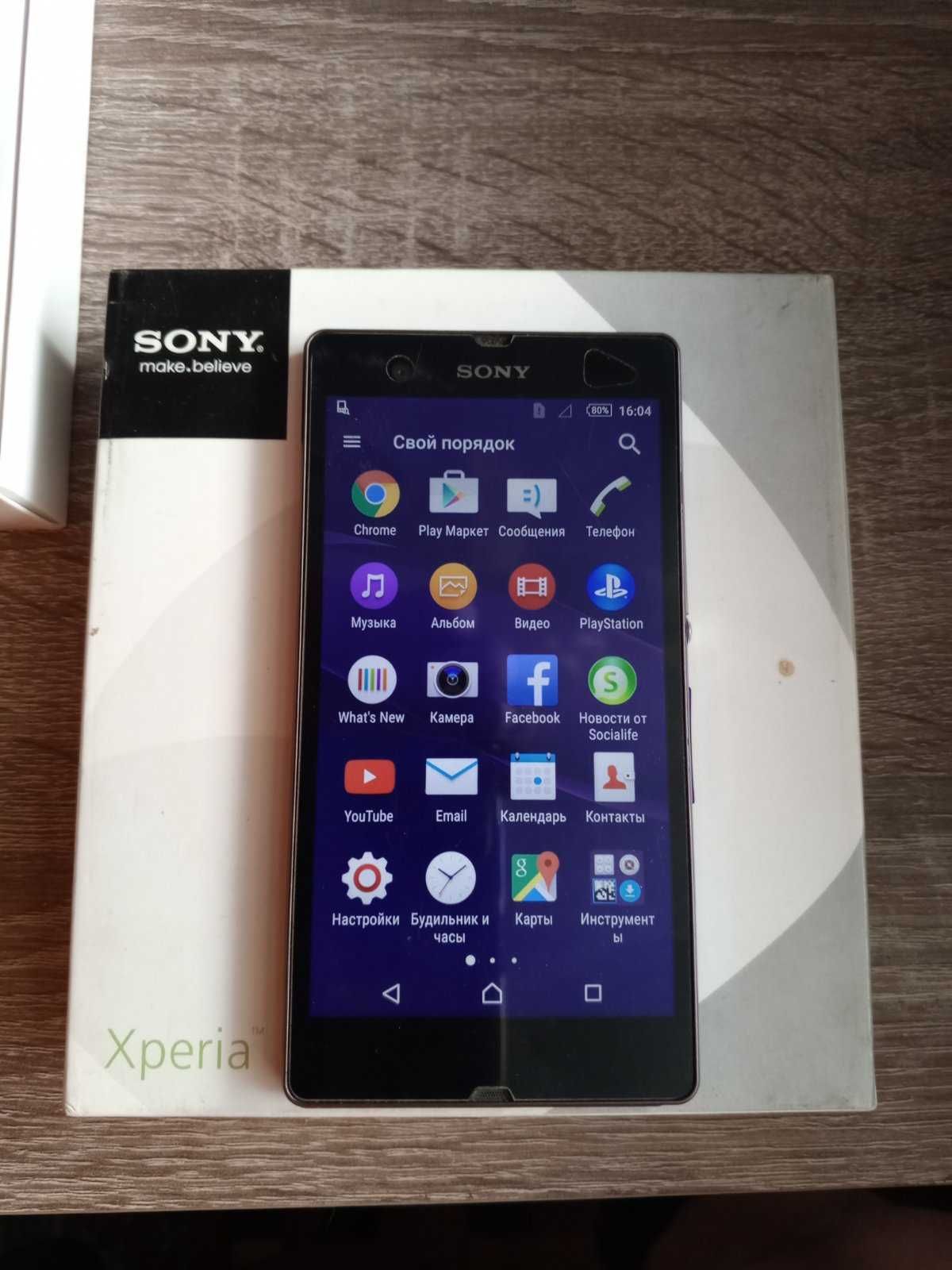 Мобільний телефон смартфон Sony Xperia  C6603 пурпур.