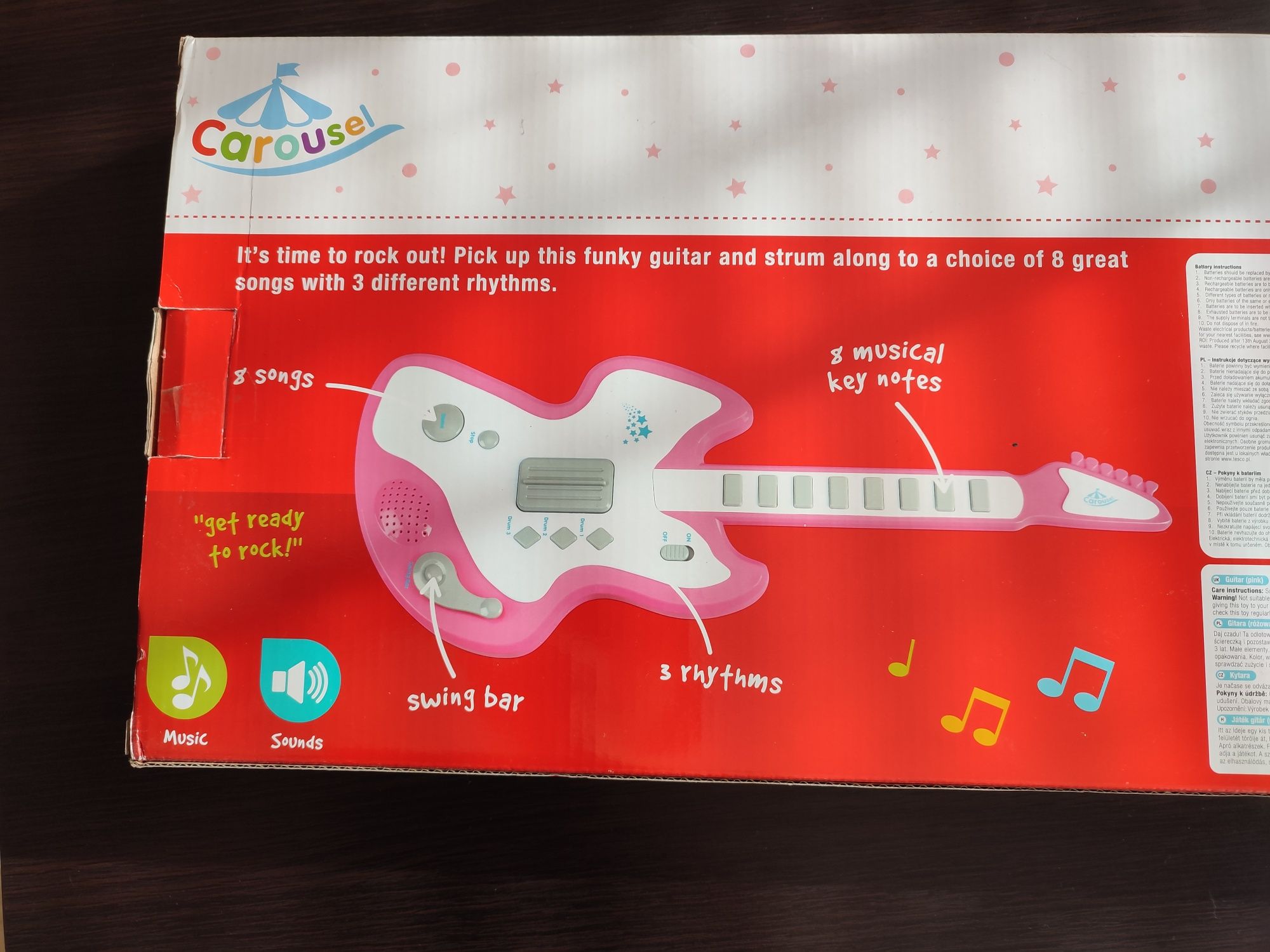 gitara grająca (58 cm) dla dziecka bez śladów użytkowania, na baterie