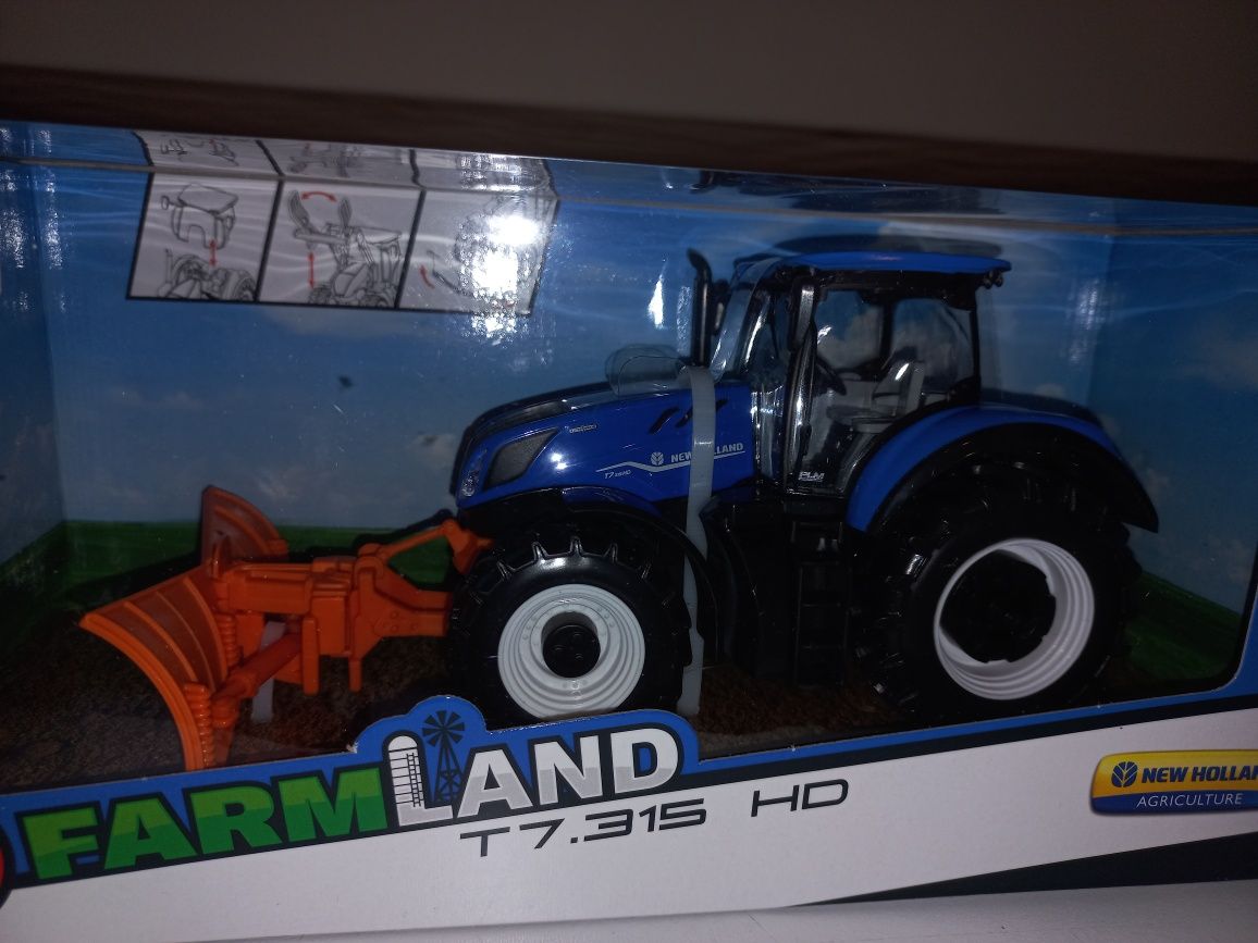 Bburago traktor New Holland,pług śnieżny,skala 1:32