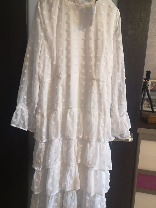 Biała sukienka boho