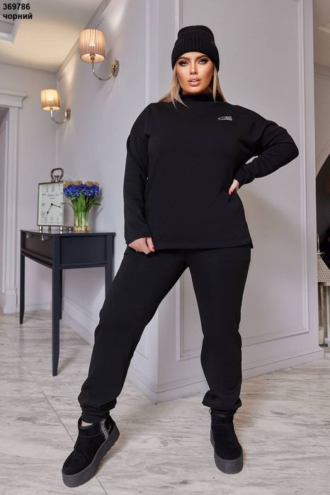 Костюми жіночі ..