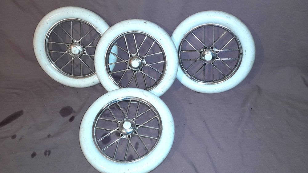 kółka do wózka dziecięcego ozdobne białe