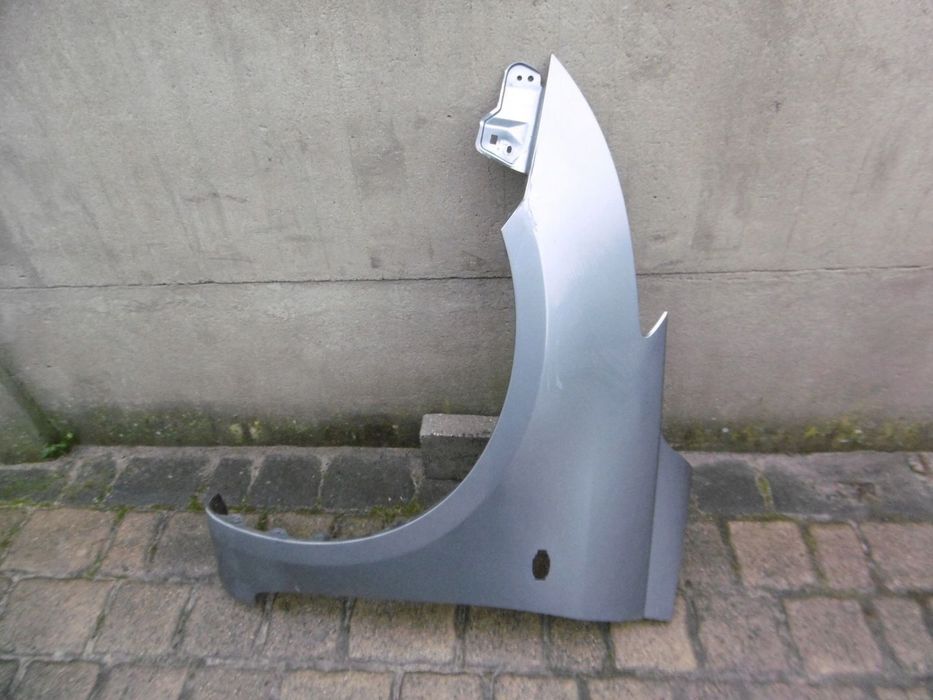 SUZUKI SWIFT MK7 - błotnik przedni lewy