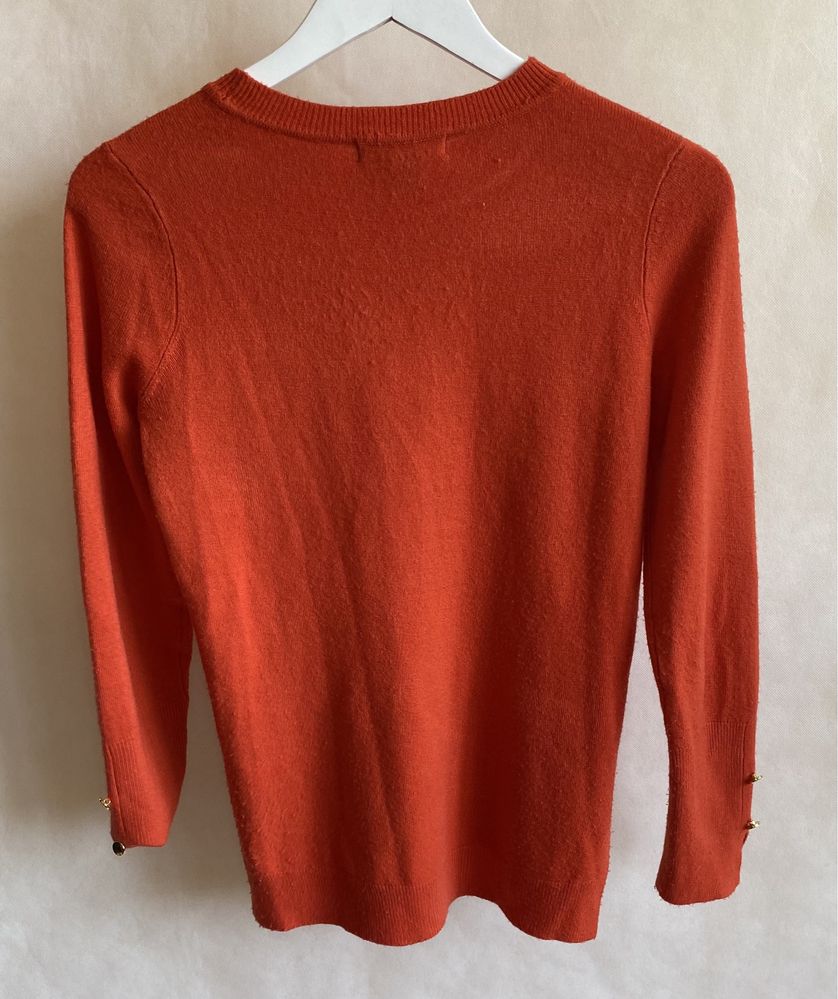 Pomarańczowy sweter Primark z guzikami na ramionach r. 32/34