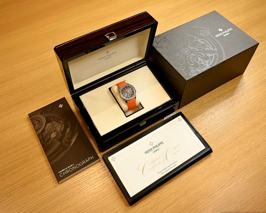 Patek Philippe Aquanaut Steel Black Dial Orange Strap