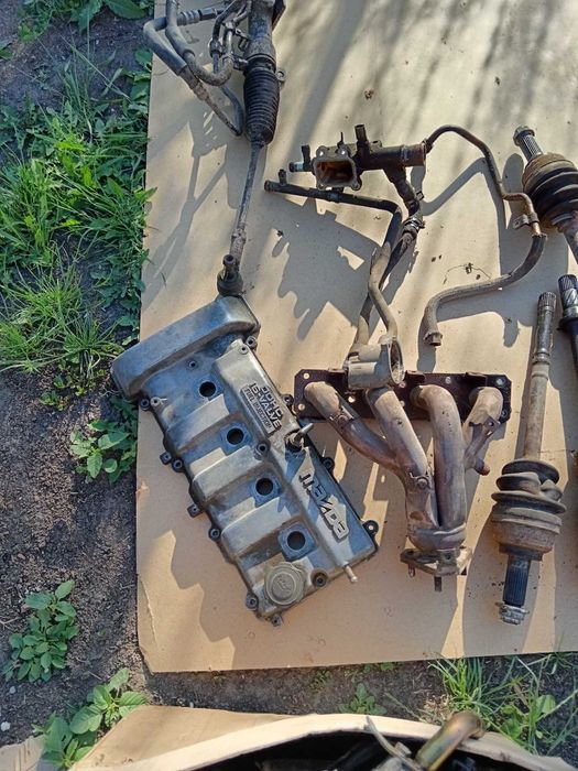 Выхлопная на мазду 626 GE 1992