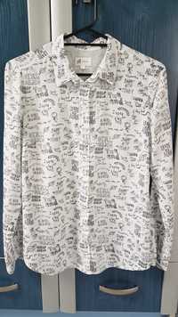 Elegancka bluzka z napisami marki Reserved dla silnej kobiety