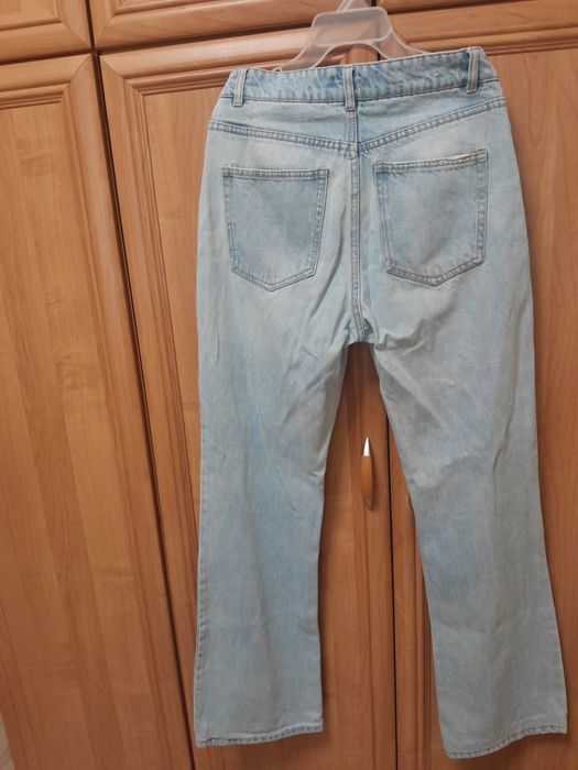 Nowe bez metki jeansy damskie dzwony z H&M