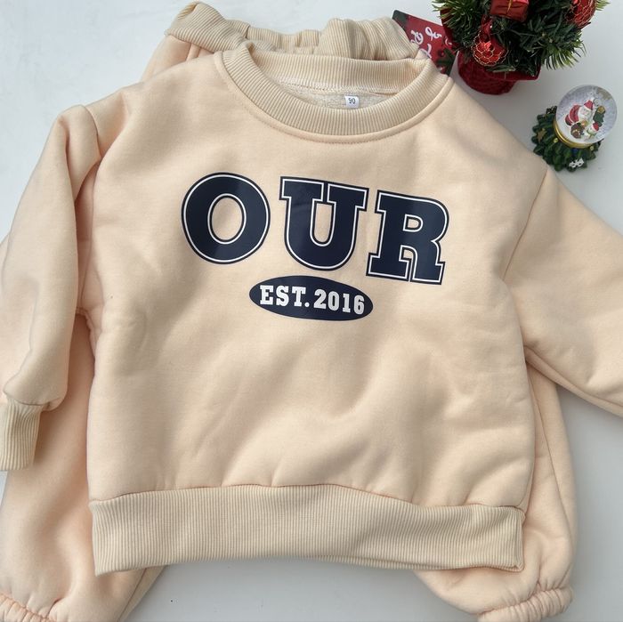 Продам утеплений штучним хутром костюм