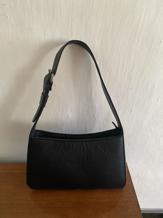Чорна шкіряна сумка від фірми teplota