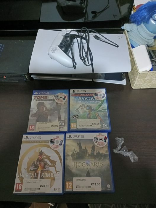 Ps5 com caixa e 4 jogos