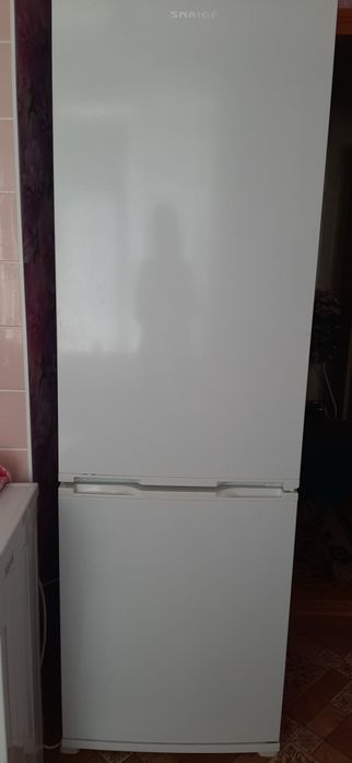 Холодильник двукамерний Снайге у навівробочому стані             Нікоп