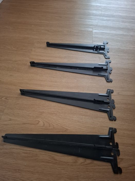 8 poleias para calha de prateleira . Preto