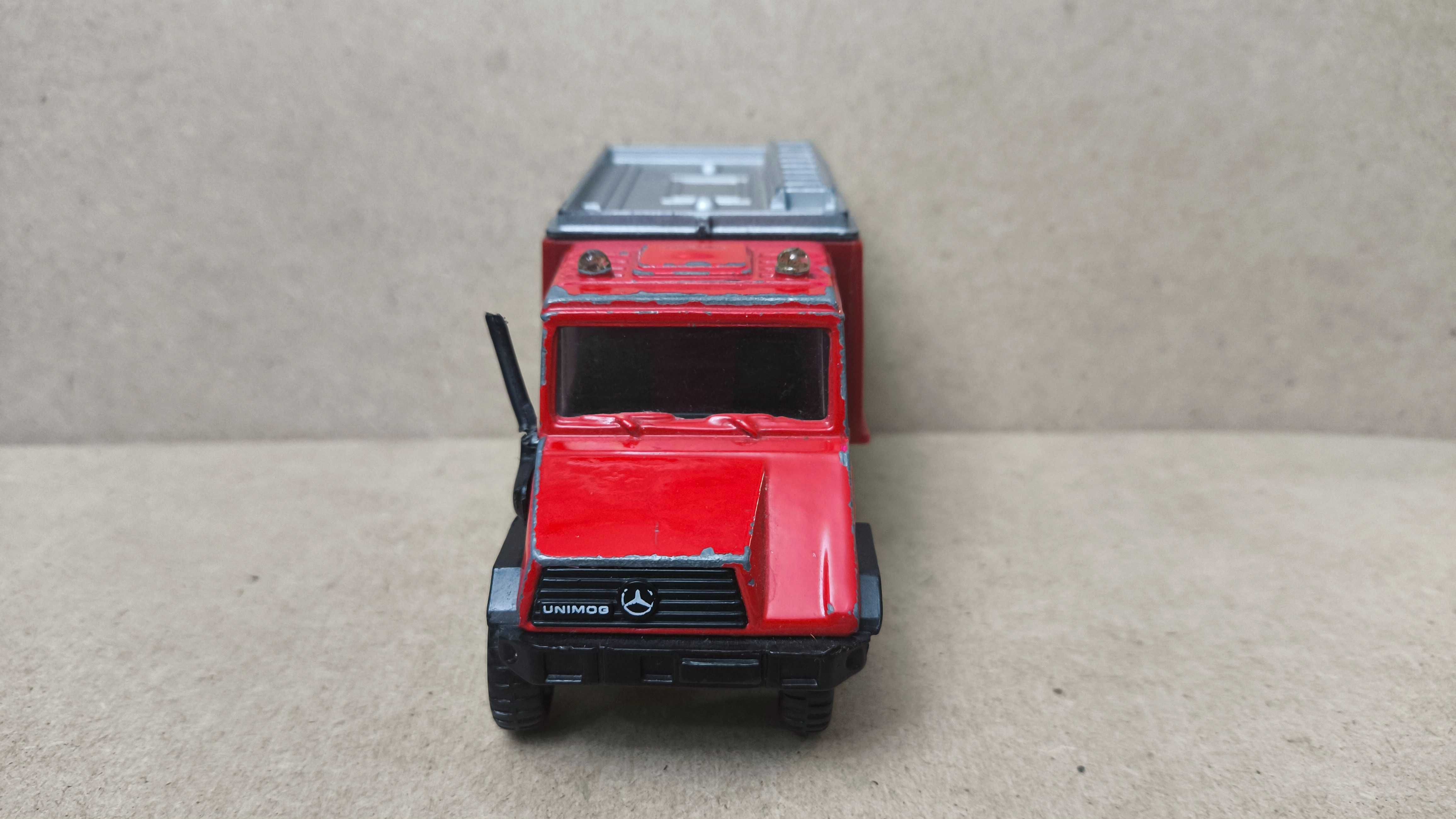 Машинка Mercedes Unimog 408 Fire Dept 1.43 Welly 9618