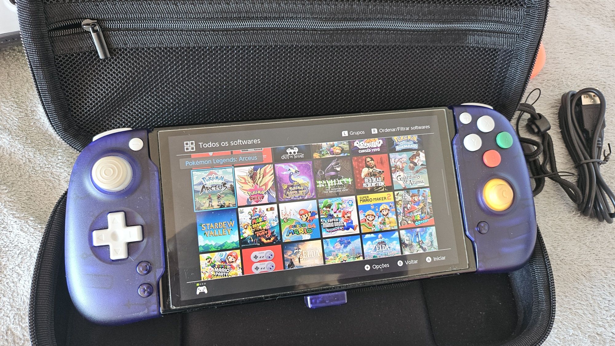 Switch oled desbloqueado completo jogos acessorios